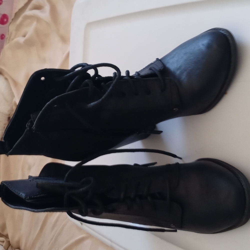 Boot size 10 with zipper ,laces up NWOT